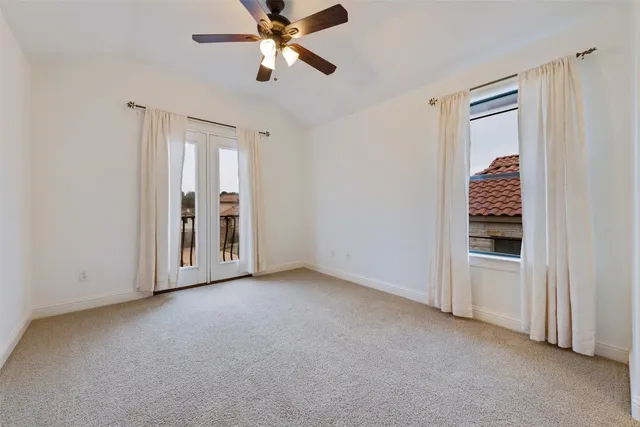 a view of empty room with closet