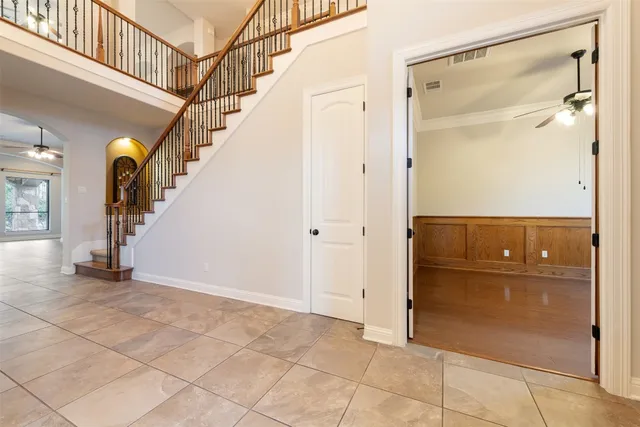 a view of an entryway with wooden floor