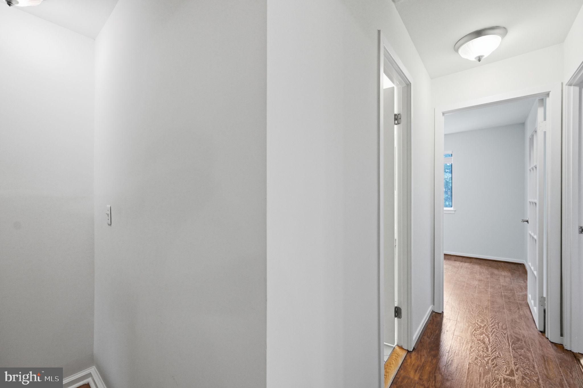 2908 Jermantown Road, Unit 24 Oakton, VA 22124 - Photo 32 of 74 Bright and inviting hallway space.