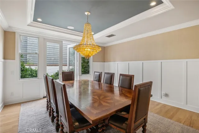 a view of a dining room with furniture and window