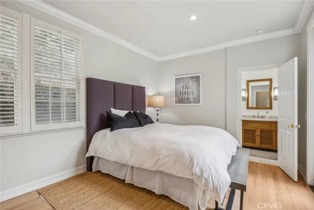 a bedroom with a bed and a cabinets