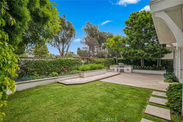 a view of a backyard with a garden