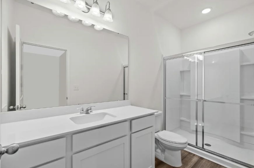 12805 Least Bittern Way Buda, TX 78610 - Photo 15 of 26 Primary Bath with Walk-in Shower - Representative Photo