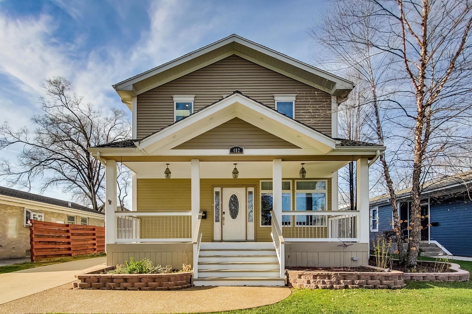482 Sumac Road Highland Park, IL 60035 - Photo 1 of 29 a front view of a house with a yard