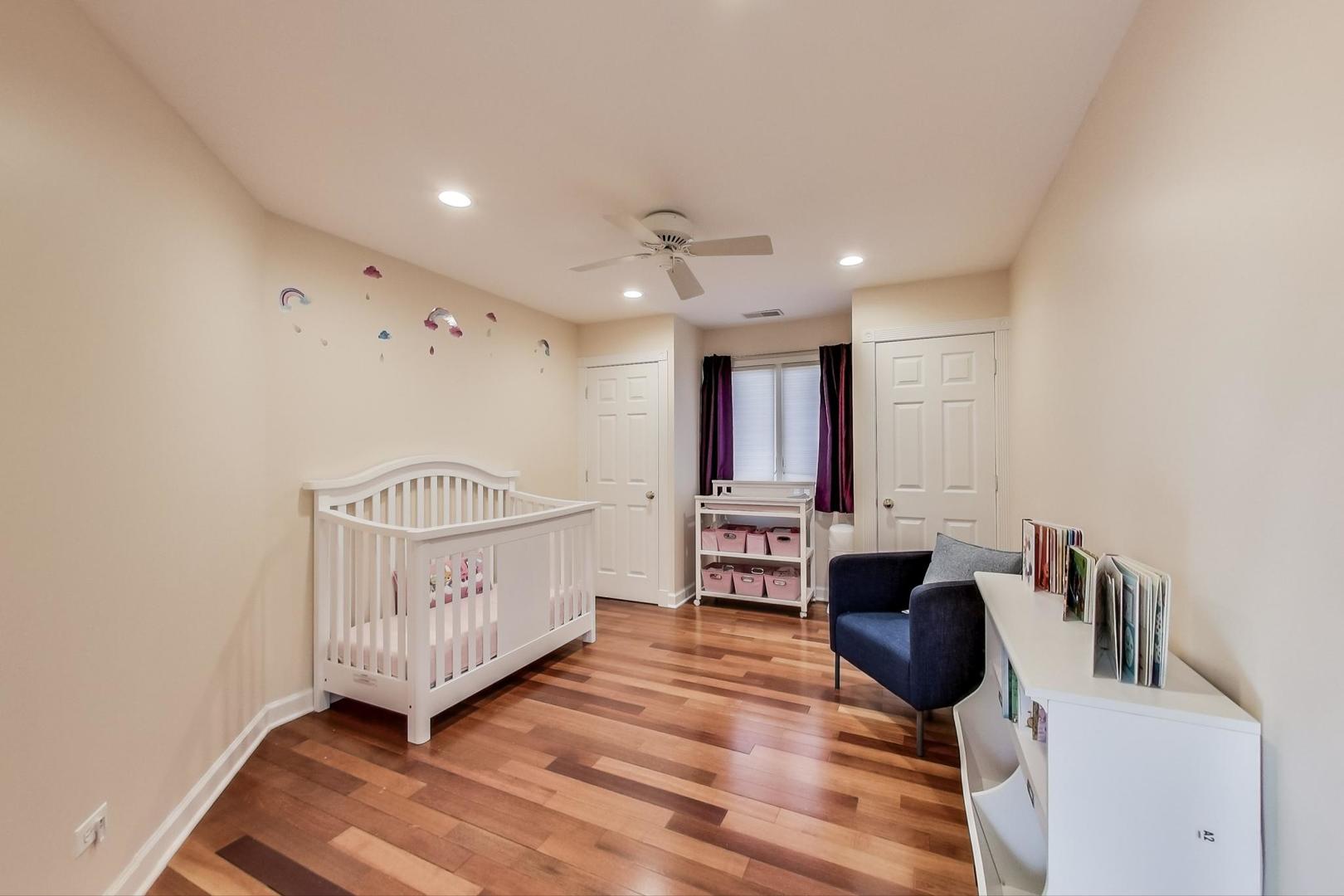 482 Sumac Road Highland Park, IL 60035 - Photo 17 of 29 a view of a room with furniture and wooden floor