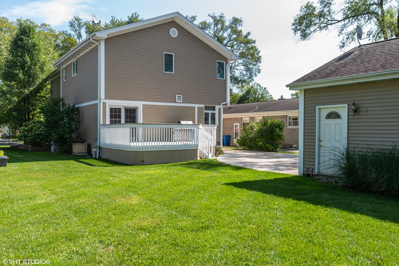 482 Sumac Road Highland Park, IL 60035 - Photo 22 of 29 a house with garden in front of it