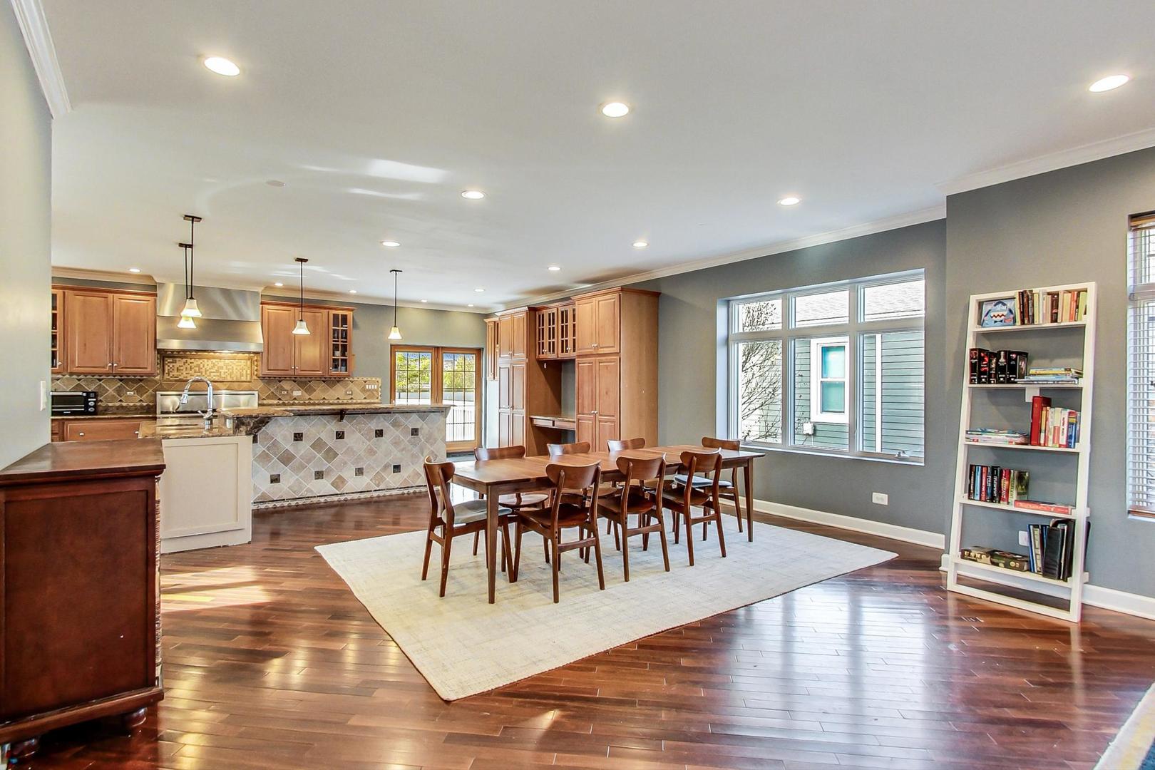 482 Sumac Road Highland Park, IL 60035 - Photo 8 of 29 a view of a dining room with furniture and wooden floor
