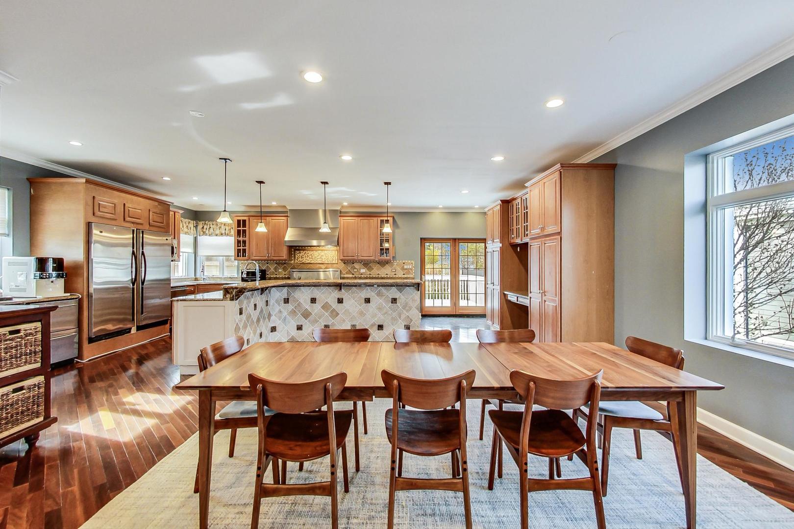 482 Sumac Road Highland Park, IL 60035 - Photo 9 of 29 a view of a dining room with furniture and window