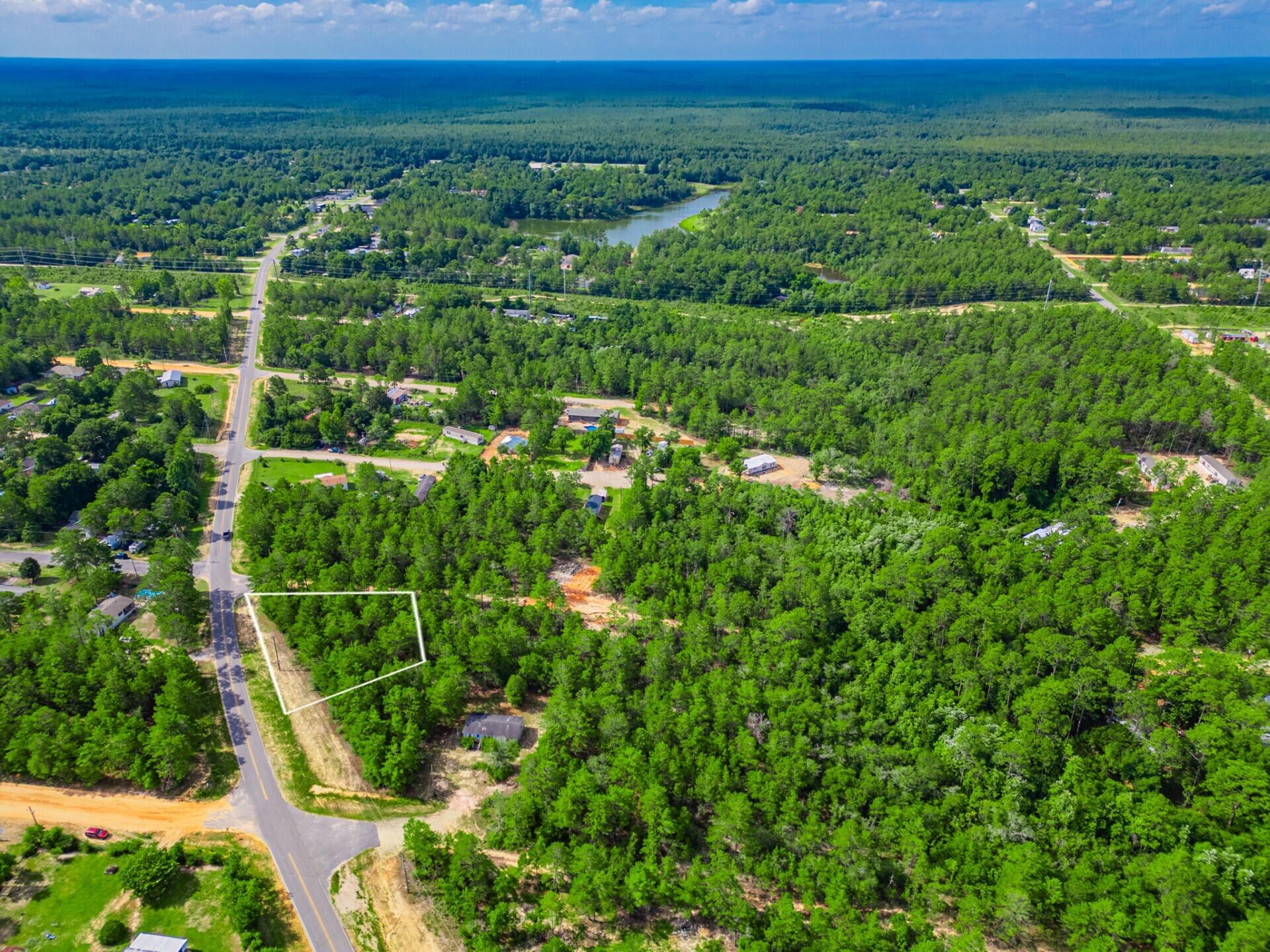 Tbd Tbd Girl Scout Road DeFuniak Springs, FL 32433 - Photo 8 of 9 a view of a lush green field