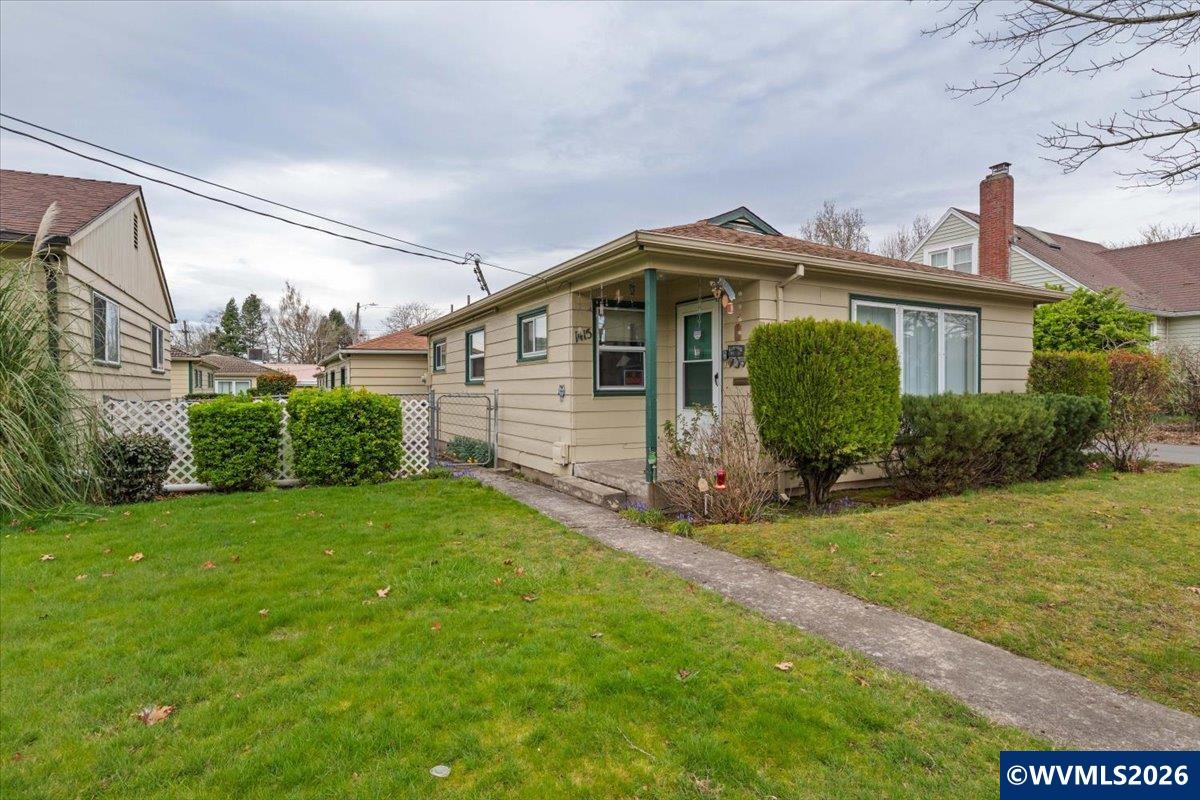 1735 Market Street Northeast Salem, OR 97301 - Photo 2 of 11 a front view of a house with garden