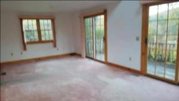 43 Middletown Hill Road Rowe, MA 01367 - Photo 2 of 17 an empty room with windows