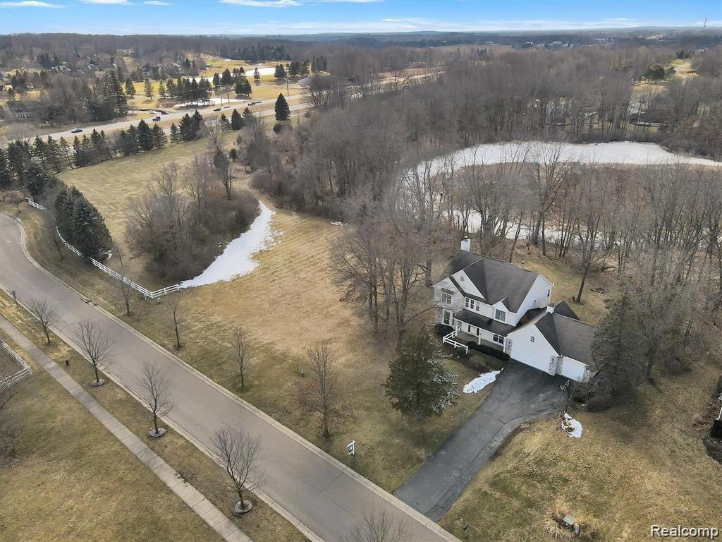 201 Timber Ridge Drive Highland, MI 48357 - Photo 37 of 39 Aerial photo of the home and extra lot
