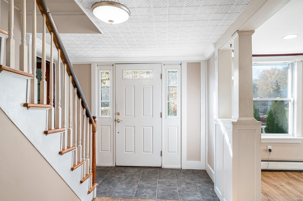 167 North Road Chelmsford, MA 01824 - Photo 5 of 38 a view of front door with stairs