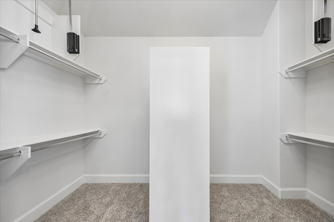 9663 Kings Cross Station Houston, TX 77045 - Photo 17 of 30 a view of a room with racks on the wall