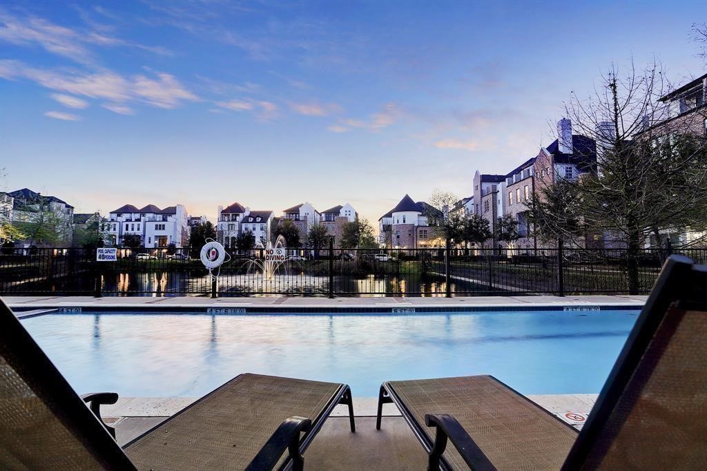 9663 Kings Cross Station Houston, TX 77045 - Photo 24 of 30 a view of a chairs and table in a balcony