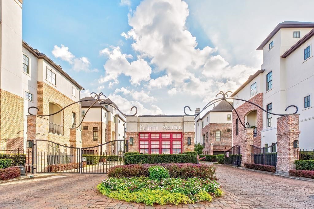 9663 Kings Cross Station Houston, TX 77045 - Photo 25 of 30 a view of a white building with many windows