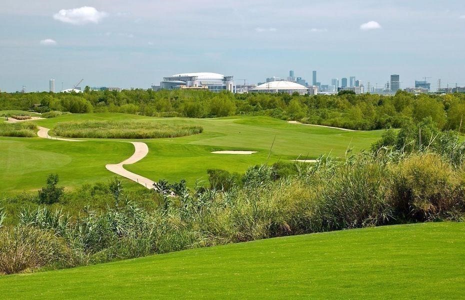 9663 Kings Cross Station Houston, TX 77045 - Photo 30 of 30 a view of a golf course with a lake