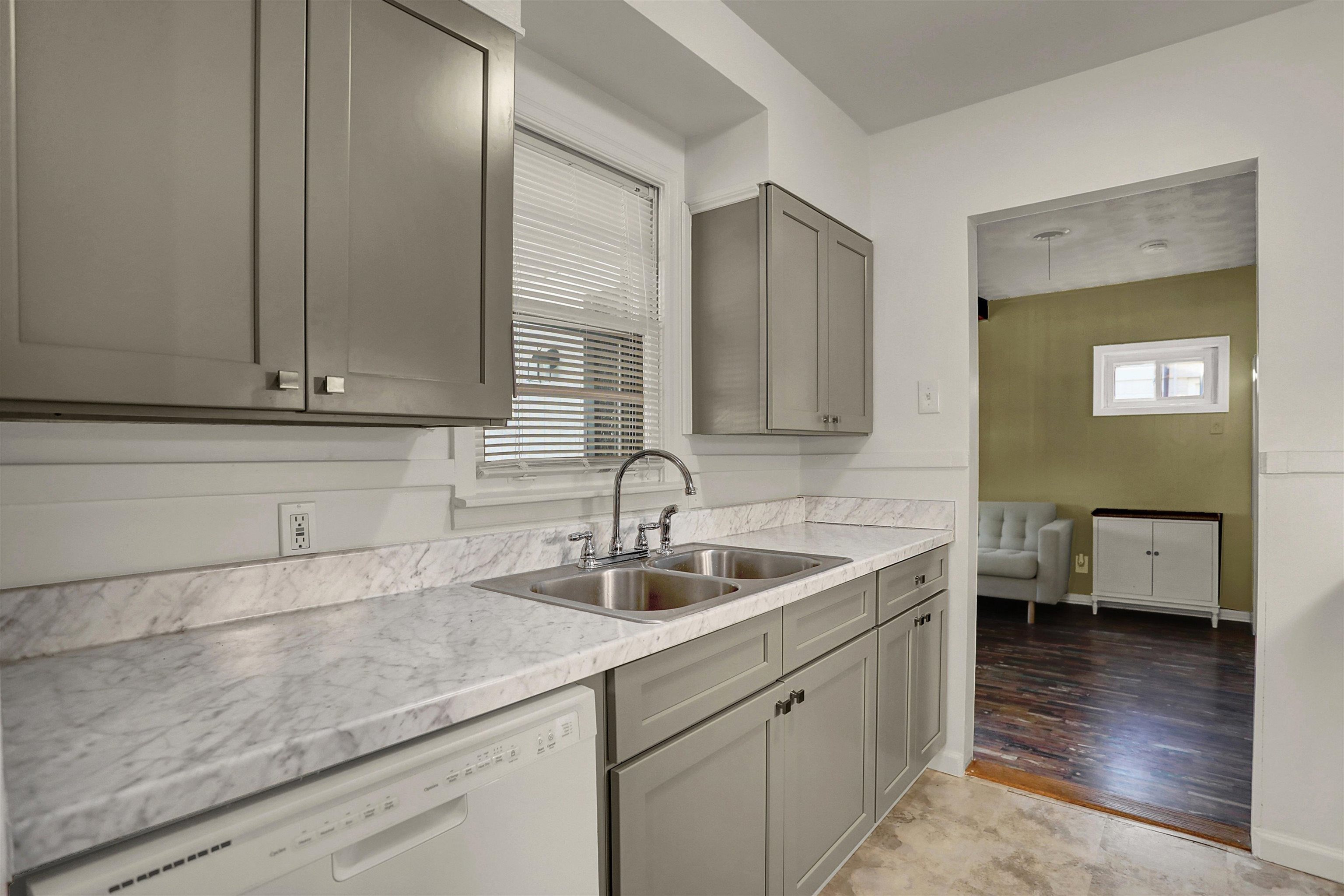 4607 Monaco Road Memphis, TN 38117 - Photo 11 of 25 a kitchen with a sink and cabinets
