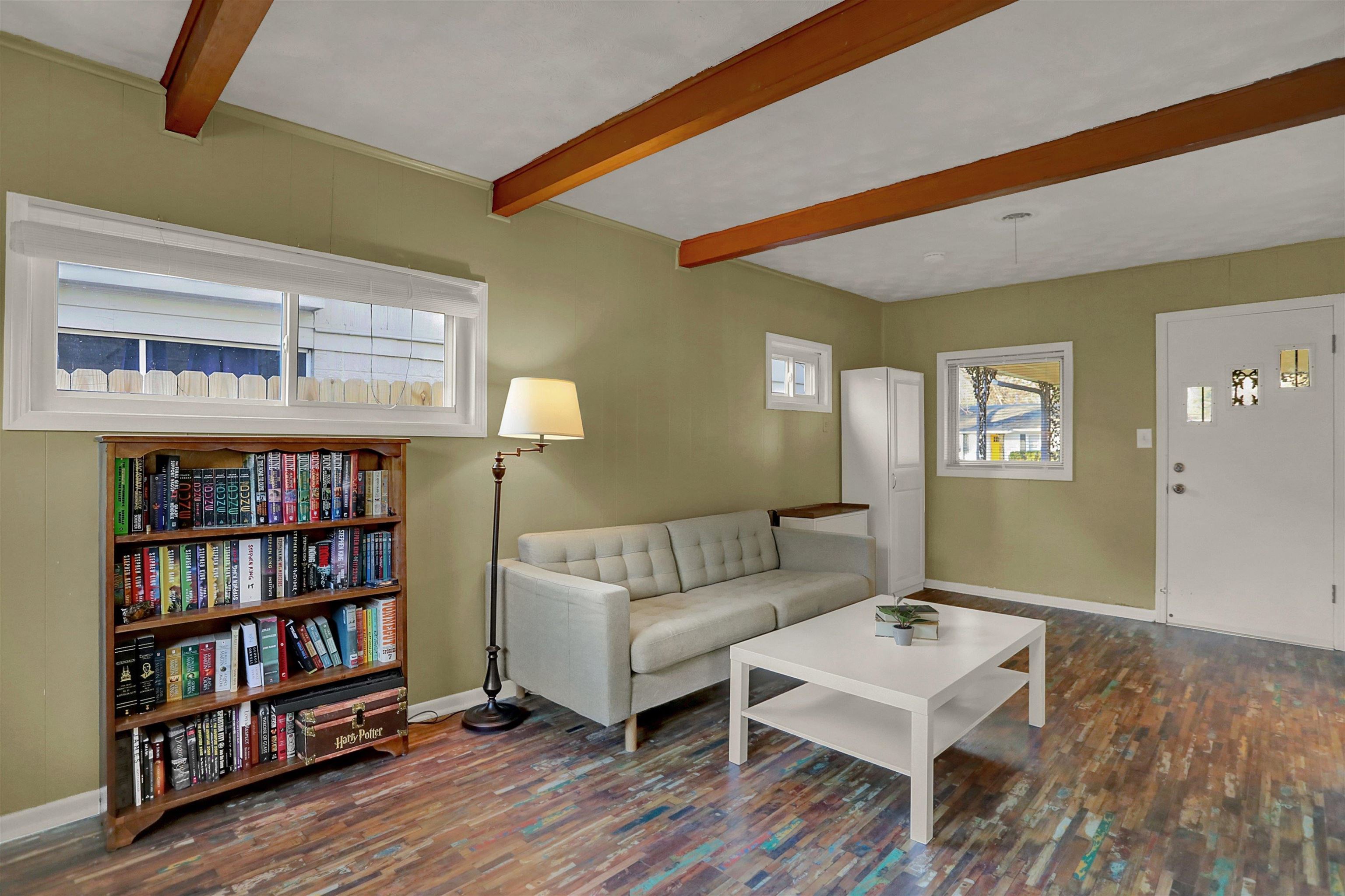 4607 Monaco Road Memphis, TN 38117 - Photo 20 of 25 a living room with furniture and a book shelf