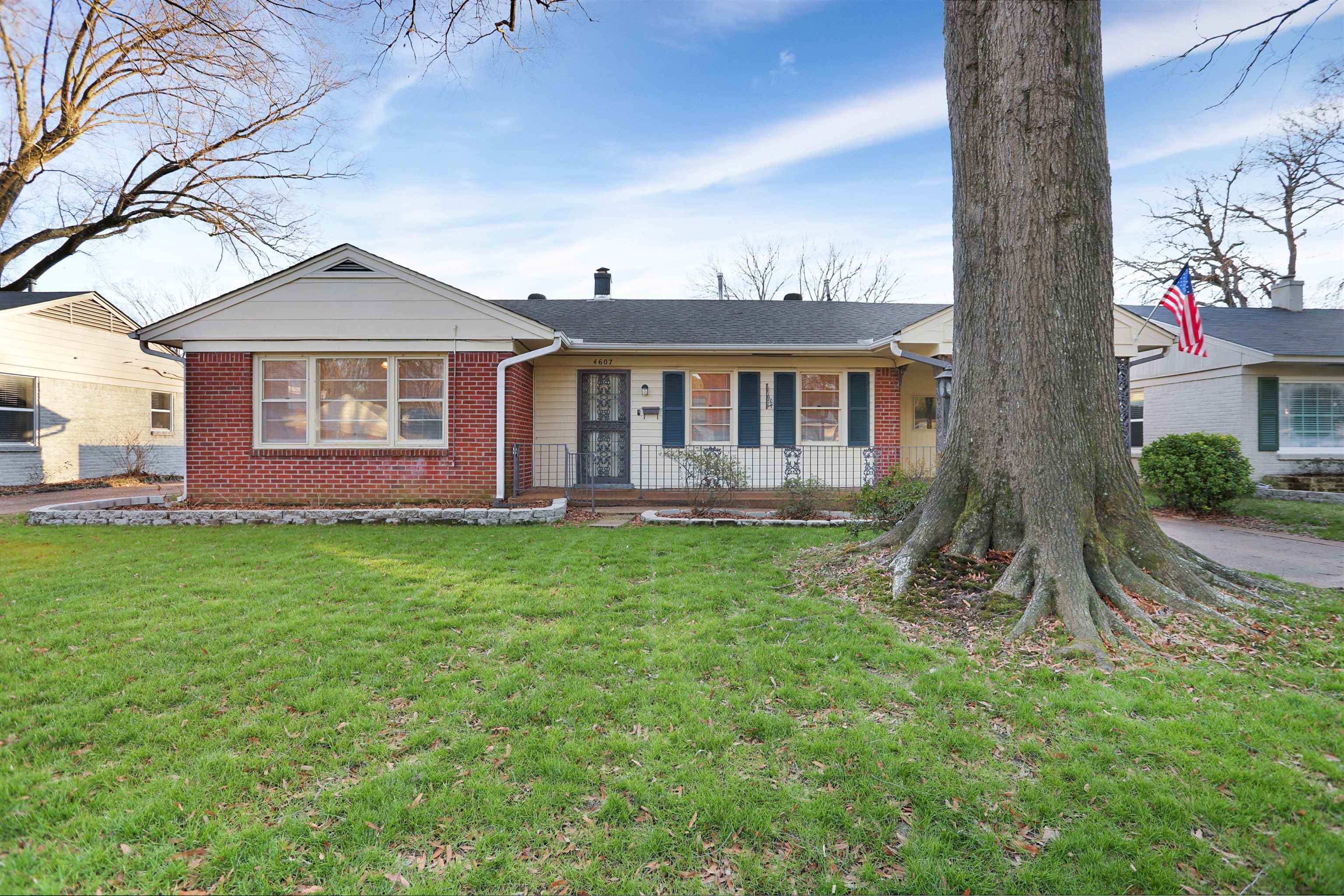 4607 Monaco Road Memphis, TN 38117 - Photo 2 of 25 a front view of a house with a yard