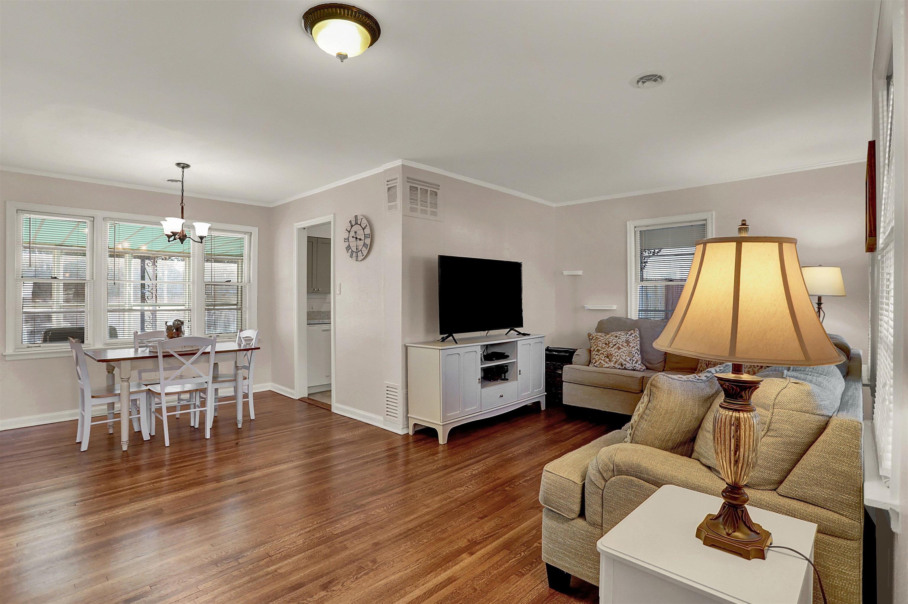 4607 Monaco Road Memphis, TN 38117 - Photo 4 of 25 a living room with furniture and a flat screen tv