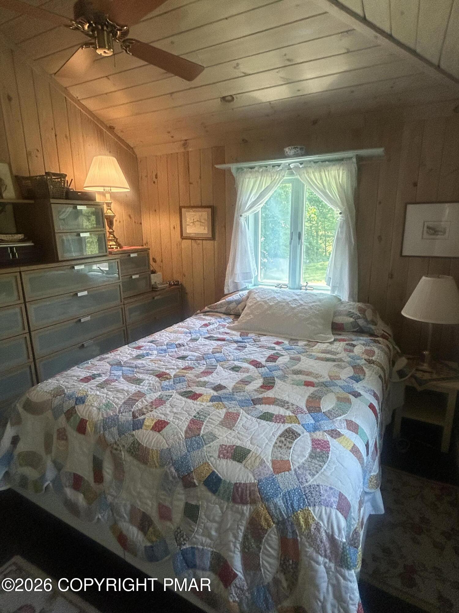 4379 River Road Mount Bethel, PA 18343 - Photo 43 of 48 a bedroom with a bed and a tv