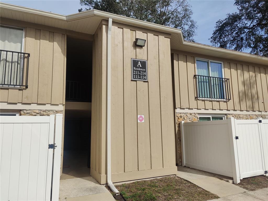 507 Northwest 39th Road, Unit 211 Gainesville, FL 32607 - Photo 1 of 1 a view of a house with a sink and dishwasher