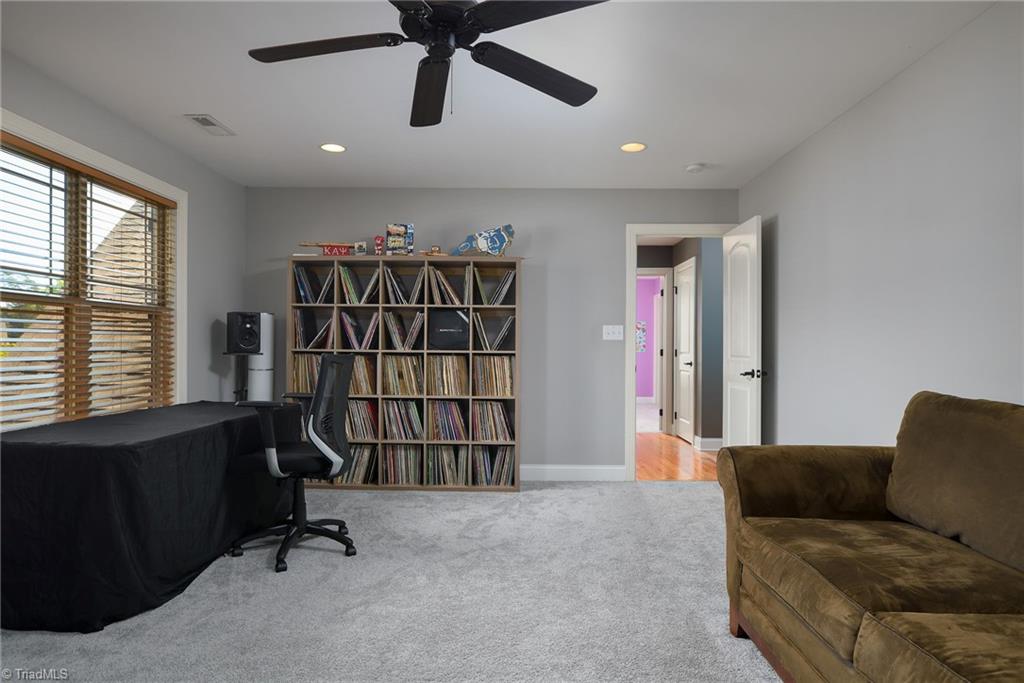 8931 Grove Park Drive Oak Ridge, NC 27310 - Photo 22 of 36 Large bonus room
