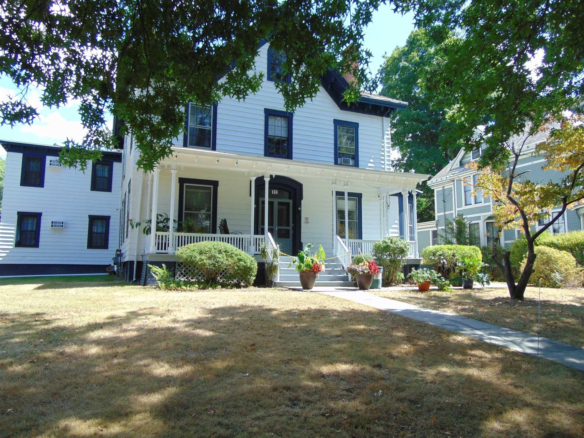 113 Academy Street, Unit 3 Poughkeepsie, NY 12601 - Photo 1 of 1 a front view of a house with a yard