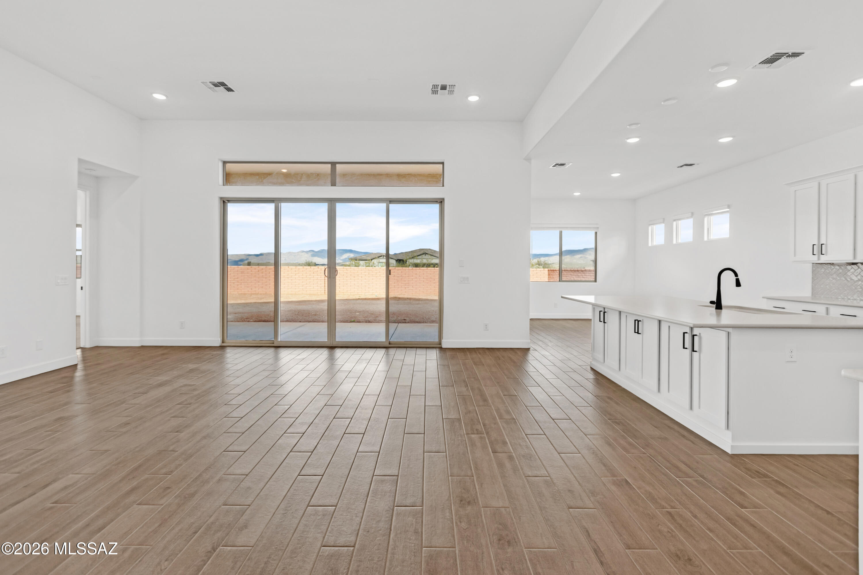 14736 East Sands Ranch Road Vail, AZ 85641 - Photo 4 of 20 a view of kitchen with wooden floor and electronic appliances