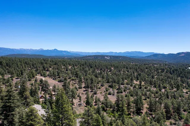 a view of a city with mountain