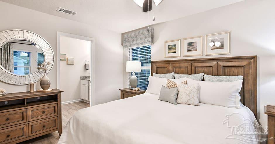 3 Egret Avenue, Unit PALM Santa Rosa Beach, FL 32459 - Photo 14 of 22 a bedroom with a bed and a dresser