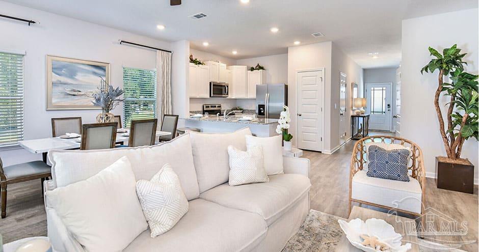 3 Egret Avenue, Unit PALM Santa Rosa Beach, FL 32459 - Photo 18 of 22 a living room with furniture white walls and a large window