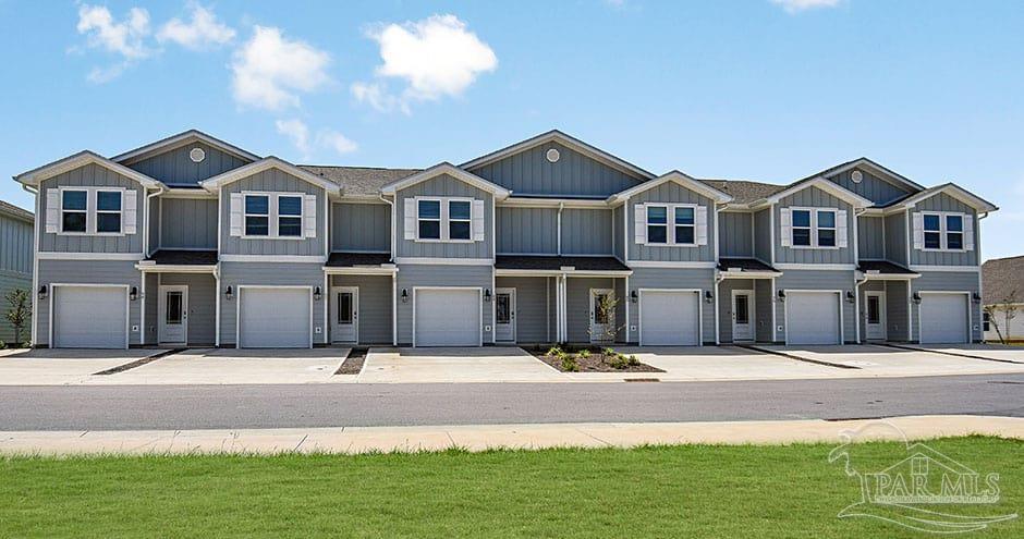 3 Egret Avenue, Unit PALM Santa Rosa Beach, FL 32459 - Photo 2 of 22 a front view of a house with a yard