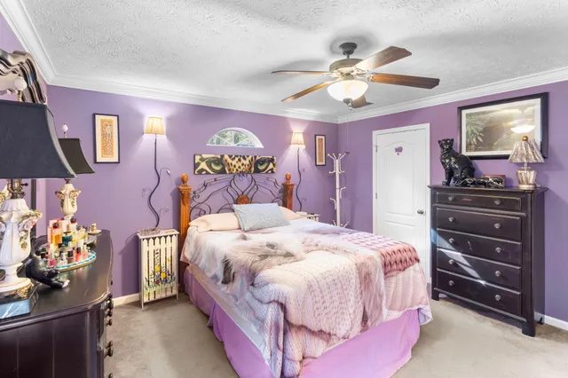 a bathroom with a tub a sink and a mirror