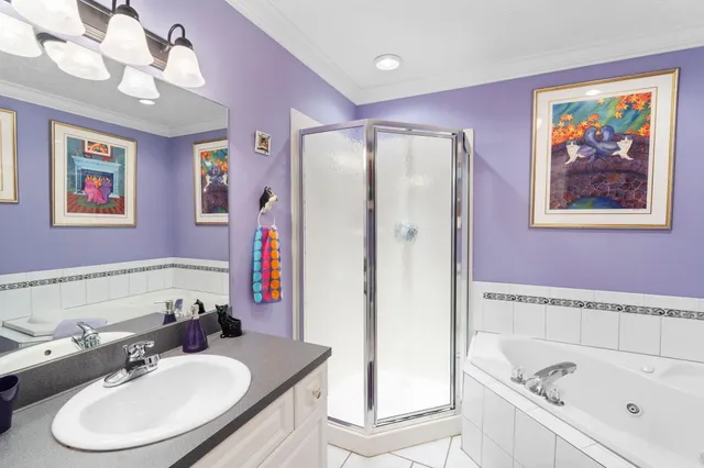 a bedroom with a bed and a table in it