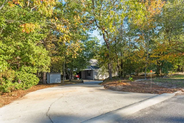 a view of a swimming pool with a porch