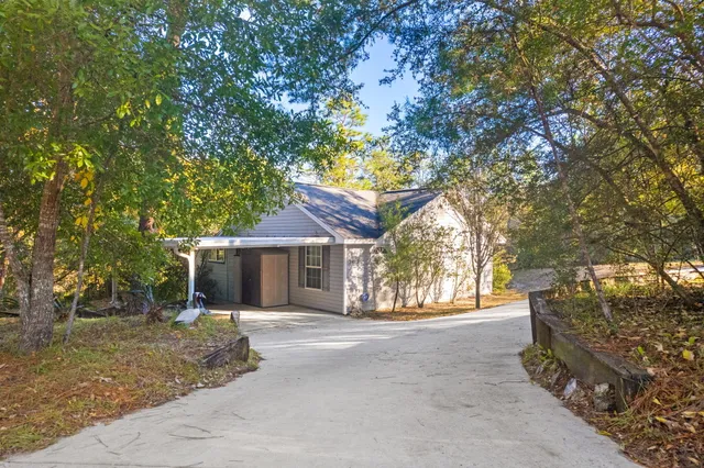 front view of a house with a trees