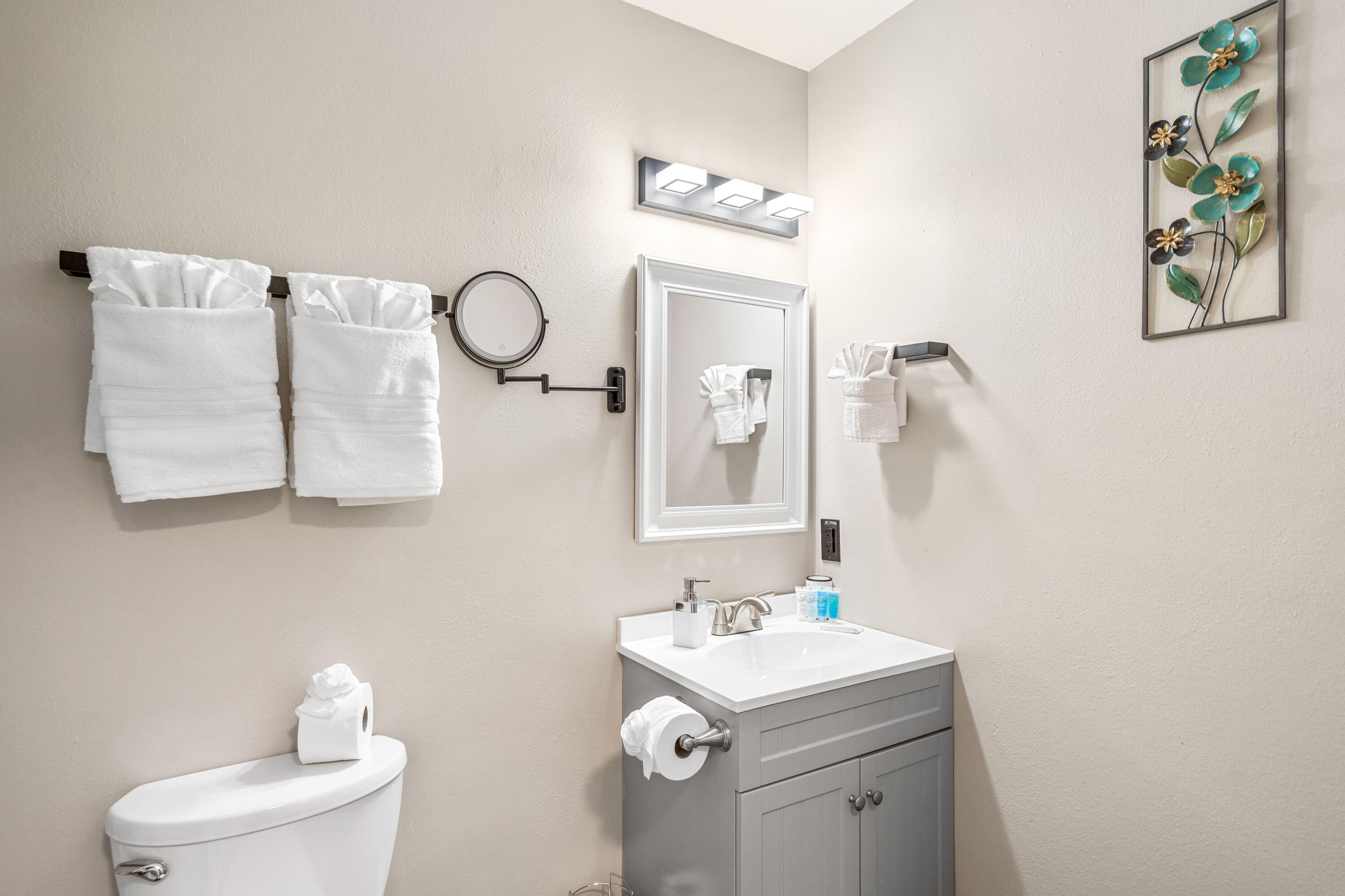 200 Sandestin Lane, Unit 1403 Miramar Beach, FL 32550 - Photo 13 of 37 a bathroom with a toilet a sink and mirror