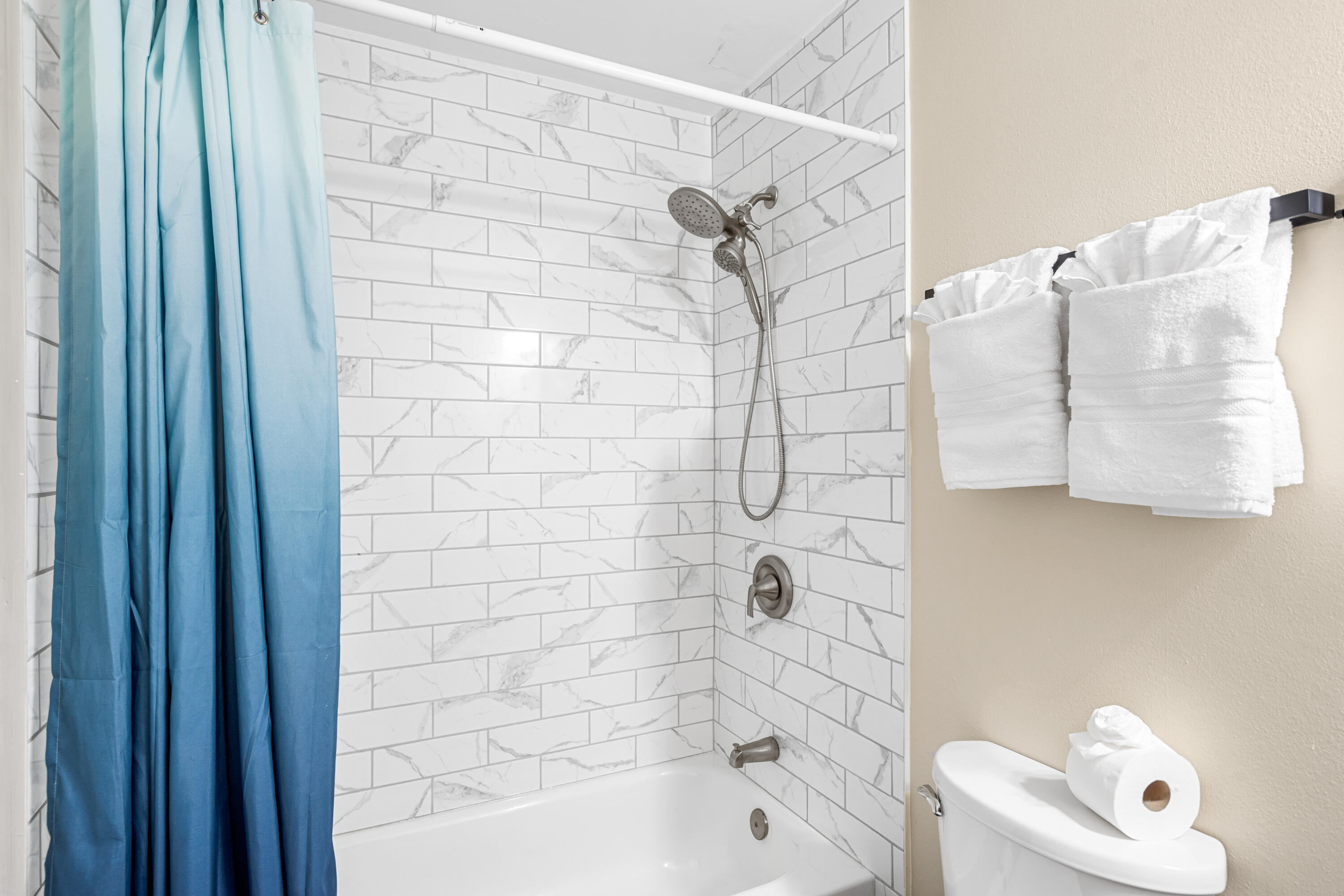 200 Sandestin Lane, Unit 1403 Miramar Beach, FL 32550 - Photo 14 of 37 a bathroom with a bathtub and shower