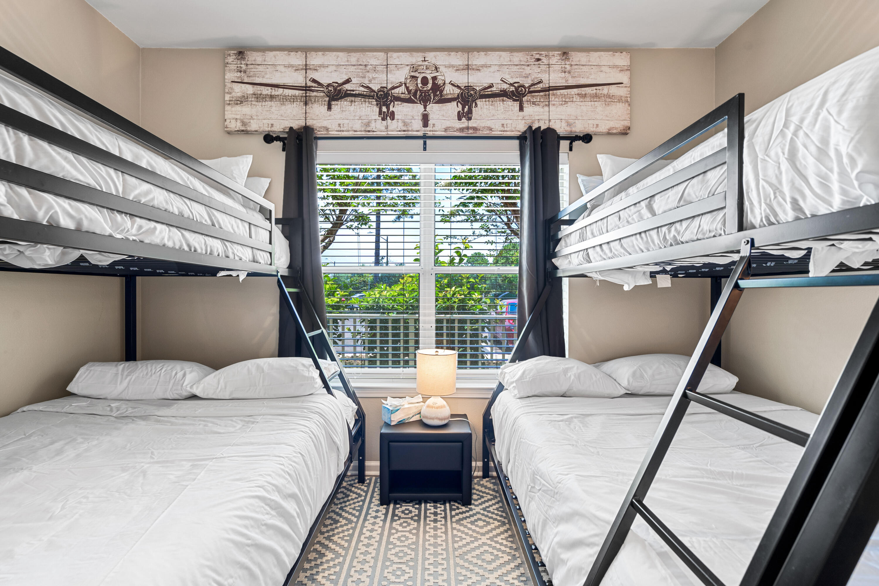 200 Sandestin Lane, Unit 1403 Miramar Beach, FL 32550 - Photo 16 of 37 a bedroom with a bed chair and window