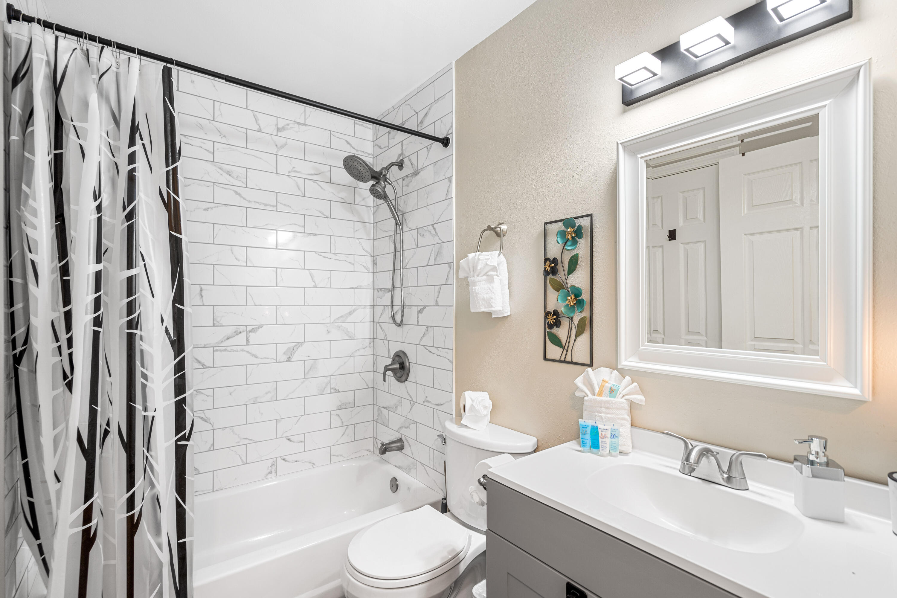 200 Sandestin Lane, Unit 1403 Miramar Beach, FL 32550 - Photo 20 of 37 a bathroom with a sink a toilet and shower