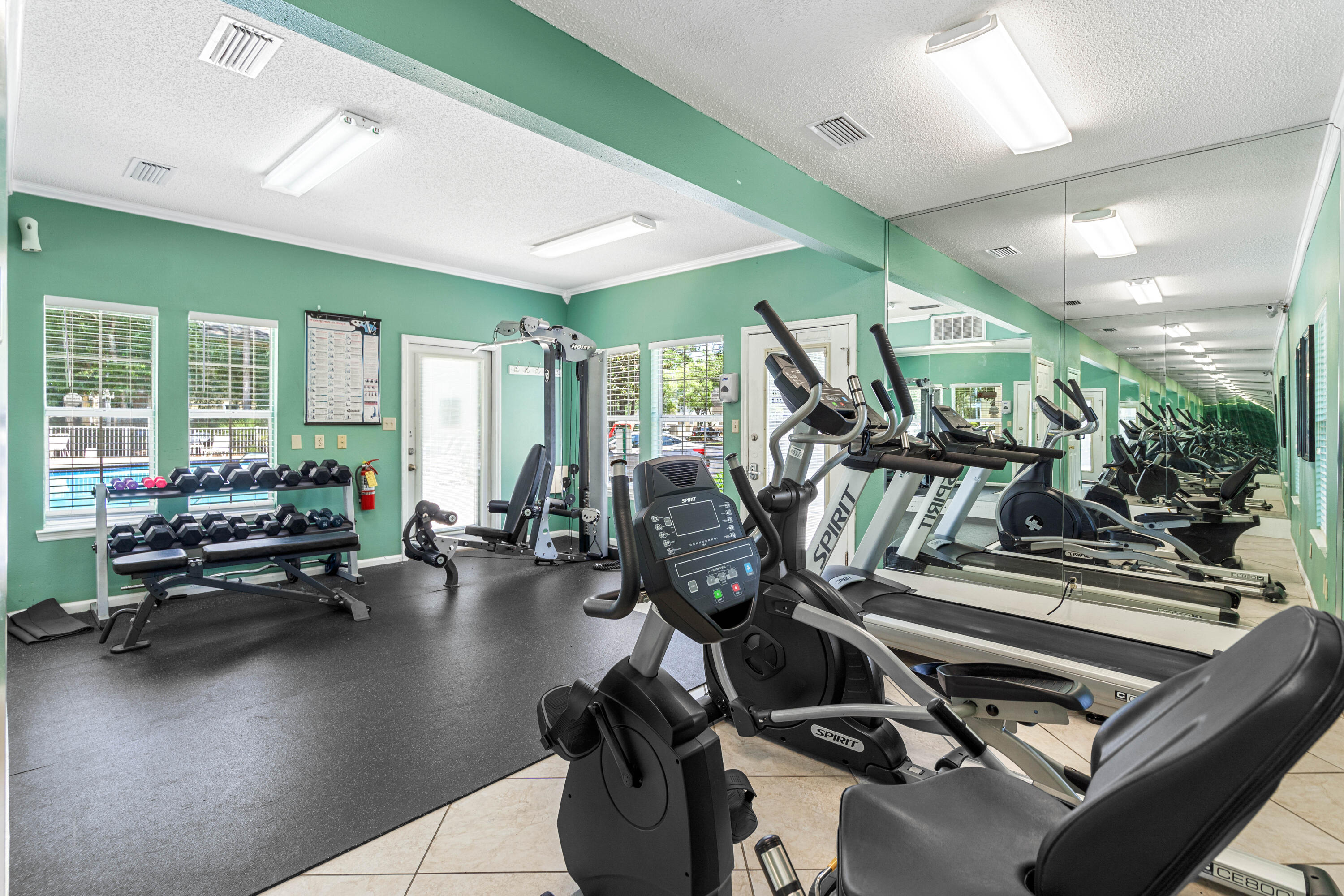 200 Sandestin Lane, Unit 1403 Miramar Beach, FL 32550 - Photo 24 of 37 a gym room with lots of gym equipment