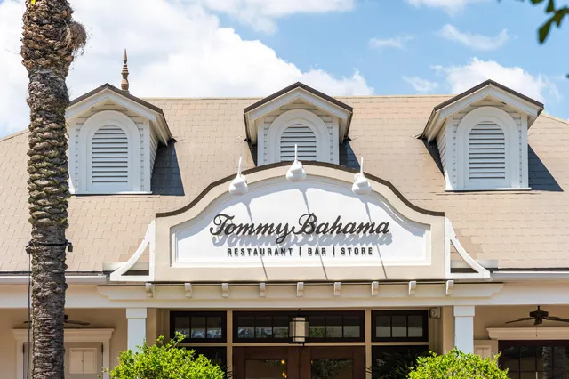 a view of a cafe with a sink and bench