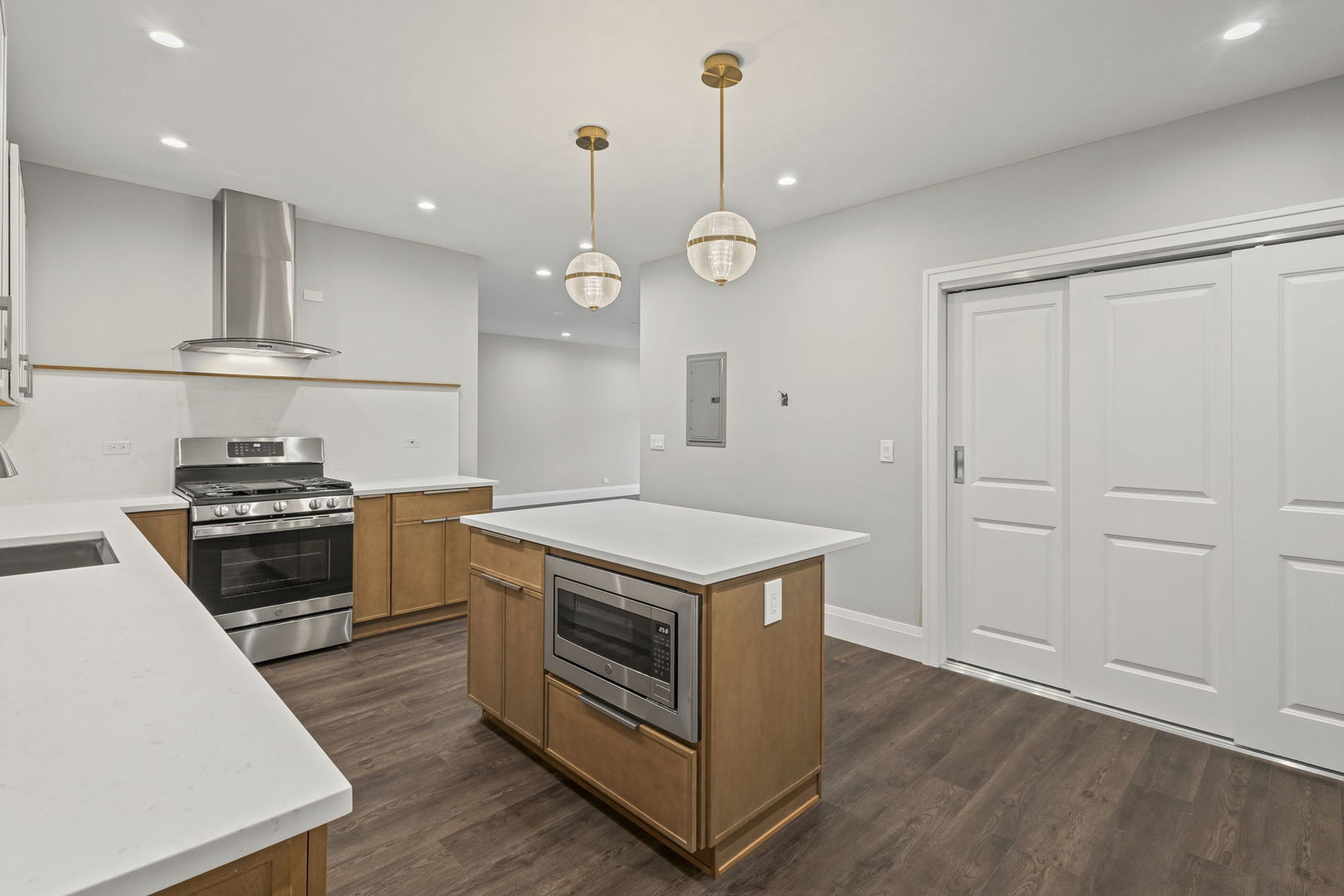1036 Lake Street, Unit 3N Oak Park, IL 60301 - Photo 11 of 24 a kitchen with a stove and a wooden floor
