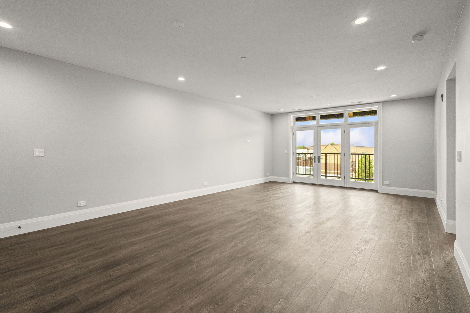 1036 Lake Street, Unit 3N Oak Park, IL 60301 - Photo 4 of 24 an empty room with wooden floor and windows