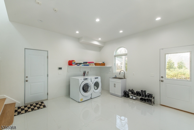 34 West Shore Road Mountain Lakes, NJ 07046 - Photo 16 of 50 a utility room with dryer and washer
