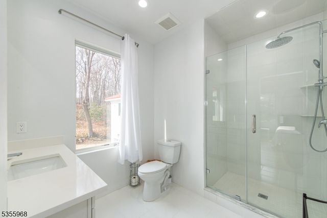 a view of a hallway with furniture and wooden floor
