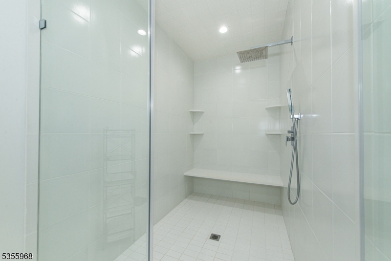 34 West Shore Road Mountain Lakes, NJ 07046 - Photo 24 of 43 a bathroom with a shower