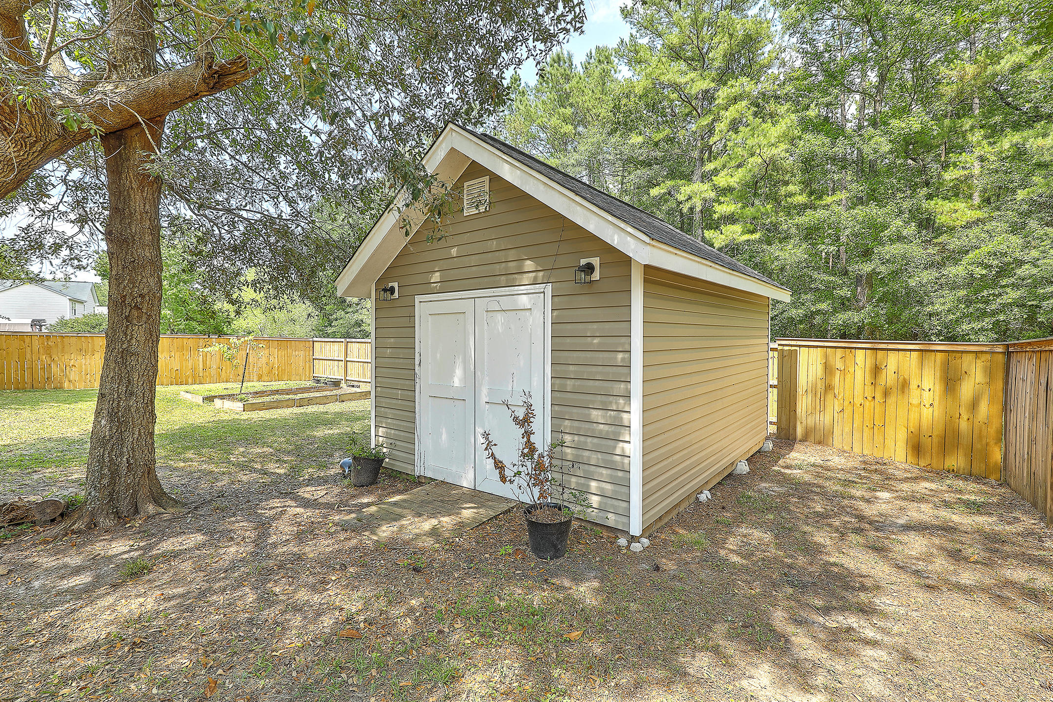 124 Harvest Moon Road Moncks Corner, SC 29461 - Photo 34 of 35 Shed/workshop to convey